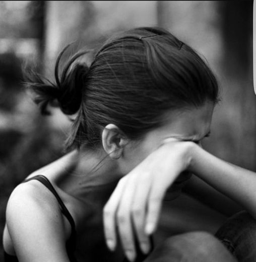 woman crying, pain